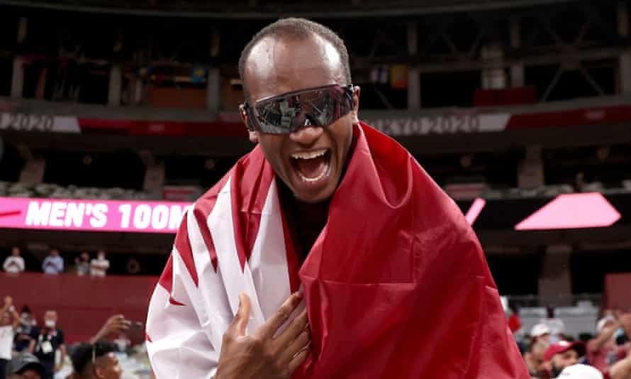 Mutaz Essa Barshim of Qatar celebrates winning gold