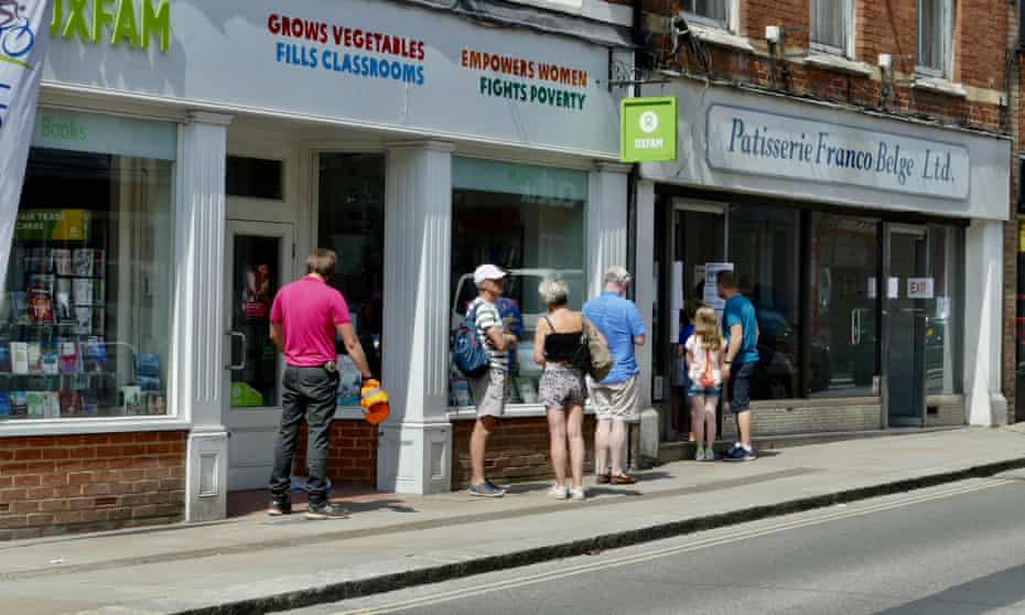 People outside a charity shop in Henley on Thames, Oxfordshire