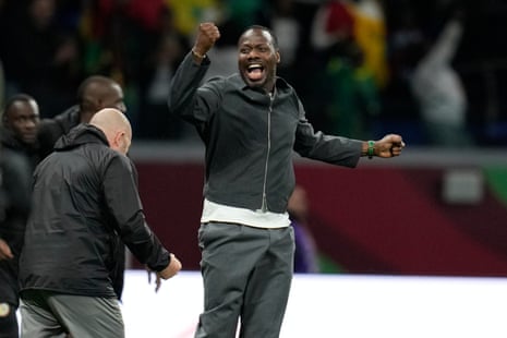 Senegal’s head coach Pape Thiaw celebrates at full-time.