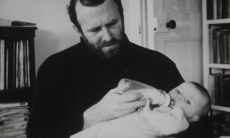 Artist Claerwen James, aged three months, with father Clive.