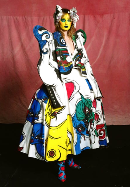 A model in a multi-coloured ‘joker’ dress with puffy shoulders, designed by Charles de Vilmorin