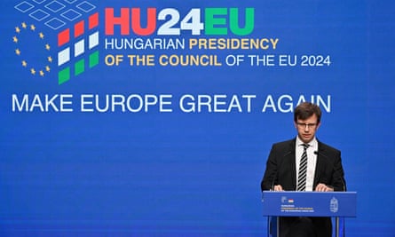 Hungary’s European affairs minister, János Bóka, speaks at a lectern in front of the words ‘Make Europe Great Again’.