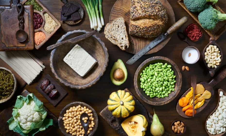 Vegan Food SelectionOverhead shot of healthy vegan food including fruit vegetables tofu and beans