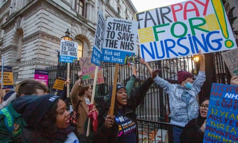 NHS staff march to Downing Street on the second day of the nurses’ strike in December