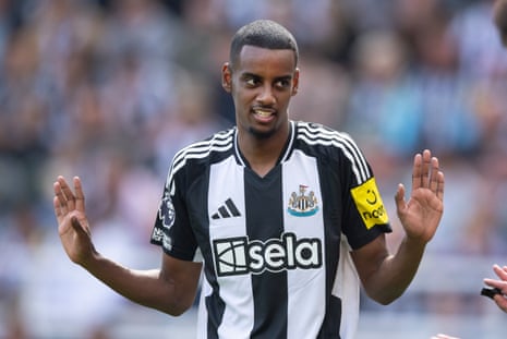 Alexander Isak holds up his hands