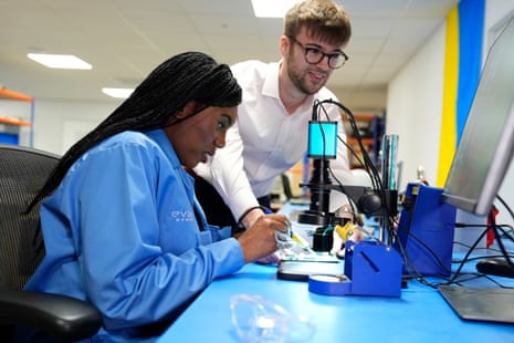 Kemi Badenoch soldering a circuit board during a visit to Evolve Dynamics, a company working on drone technology, in Farnham, Hampshire, today.