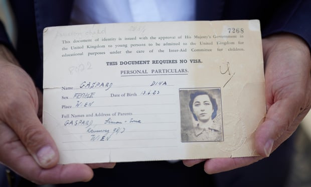 Mark King shows an entry document that belonged to him mother Dina King (nee Gaspar) when she arrived in Harwich in 1939 from Austria.