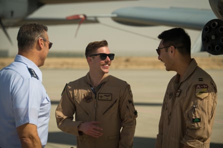 Wulfson (centre) with two colleagues at the Dubai airshow in UAE in 2019.