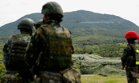 A Taiwan military AH-64 Apache helicopter fires during the Joint Combat Training Exercises in Pingtung county, Taiwan