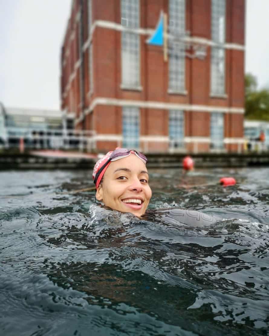 Omie Dale swimming in a river in an urban area