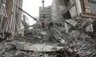 Protesters in Iran shout down cleric amid anger over building collapse