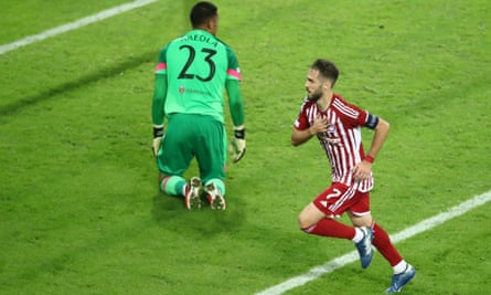 Kostas Fortounis celebrates opening the scoring for Olympiakos against West Ham