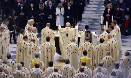 The archbishop of Paris, Laurent Ulrich, leads prayers for the consecration of the new altar