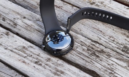 The Google Pixel Watch 2 with its strap detached.