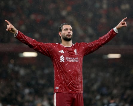 Dominik Szoboszlai salutes Anfield after his strike gave Liverpool a 3-1 lead n stoppage time.