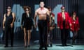 This image released by Jeffrey Richards Associates shows Benjamin Walker, center, and the cast during a performance of “American Psycho,” opening at the Gerald Schoenfeld Theatre in New York. (Jeremy Daniel/Jeffrey Richards Associates via AP)