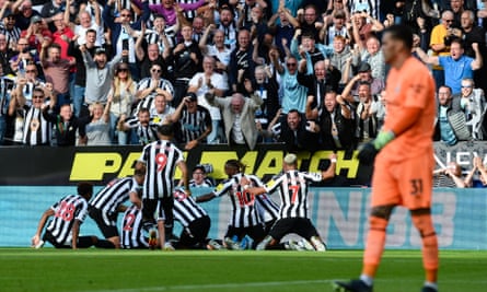 Kieran Trippier leads the celebrations after putting Newcastle 3-1 up against the champions