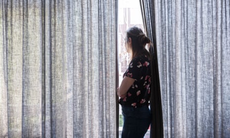 Woman looking outside the window