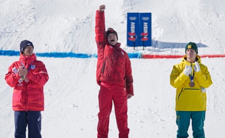 Mikaël Kingsbury celebrates his freestyle skiing gold medal.