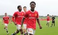 Kobbie Mainoo in action for Manchester United's under-18s in 2021.