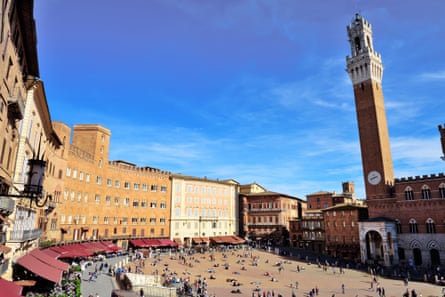 Square one … Piazza del Campo, Siena, ItalyOutdoor restaurants on edge of plazza which is at the center of the old town.