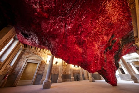 Giant red and black sculpture housed in the historic Palazzo Manfrin in Venice in 2022.