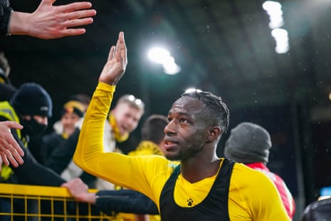 Hassane Kamara high-fives the travelling fans after Watford’s 0-0 draw with Burnley at Turf Moor in February
