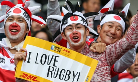 Japanese fans cheer on their team during the Rugby World Cup 2015win over Samoa. Back home 25 million people watched the game on TV - a world record.