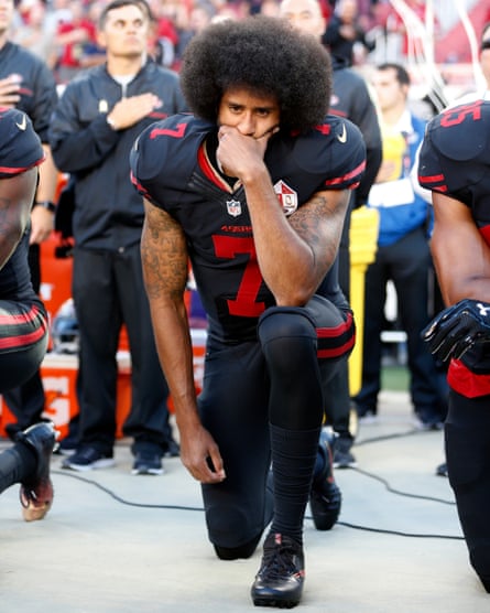 Kaepernick takes the knee before a San Francisco 49ers game against Arizona Cardinals in October 2016.