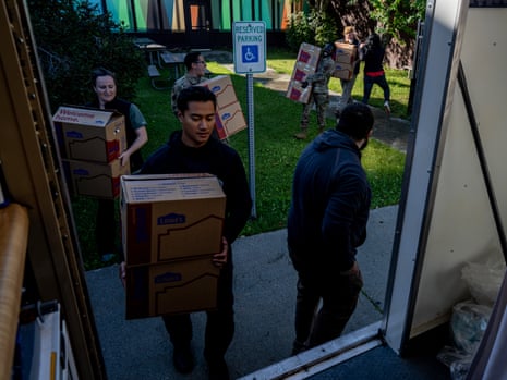 people carrying boxes