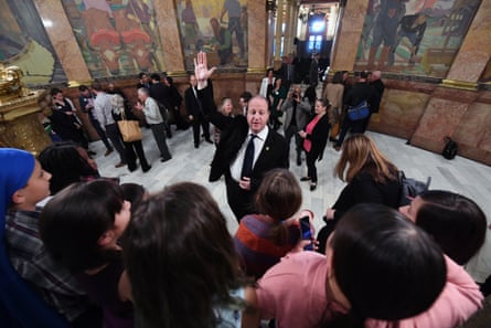 Governor Jared Polis greets school groups at the Colorado statehouse.