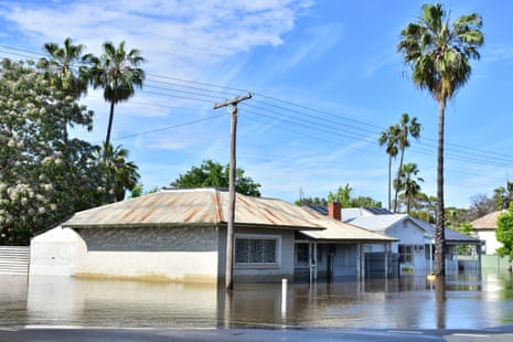 A row of houses submerged in flood waters