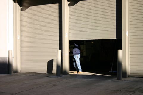 Person closing garage door
