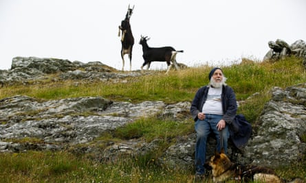 Four legs good: goats on Cléire Farm, run by Ed Harper (with guide dog Izzy).