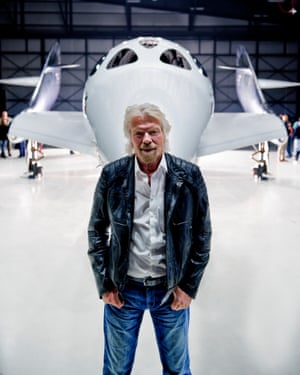 Richard Branson with a Virgin Galactic space aircraft at the company’s Mojave desert headquarters.