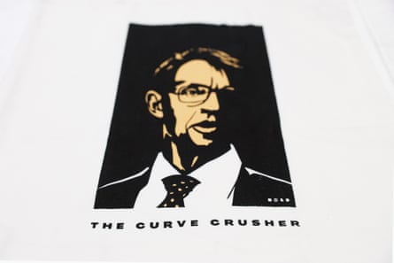 A tote bag with a drawing of Ashley Bloomfield and the words ‘The Curve Crusher’