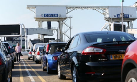 Cars queue to board a ferry in Dover bound for Dunkirk, France