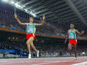 Hicham El Guerrouj beats Kenenisa Bekele to win the 5,000m at the Athens Olympics.