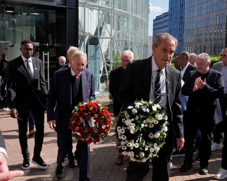 Kenny Dalglish (centre), Shola Ameobi and Bobby Moncur (right) lay down a wreath of roses in memory of the late Kevin Keegan at St James’ Park.