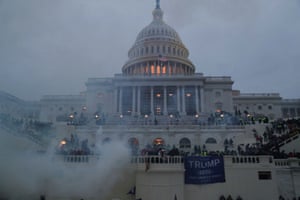 A pro-Trump mob clashes with police officers in front of the US Capitol.