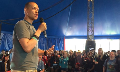Clive Lewis MP, holding microphone, at a Leftfield event