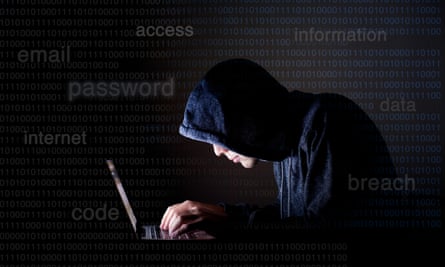 A computer hacker (posed by model).