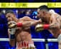 Rolando Romero (left) tries to evade a punch from Teófimo López on Saturday night in Las Vegas.