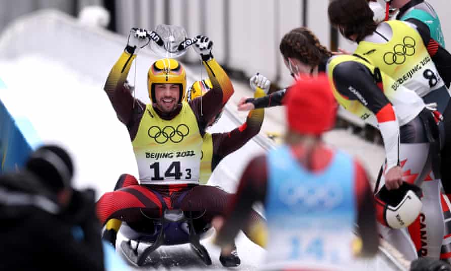 Tobias Wendl and Tobias Arlt of Germany celebrate gold in the luge team relay