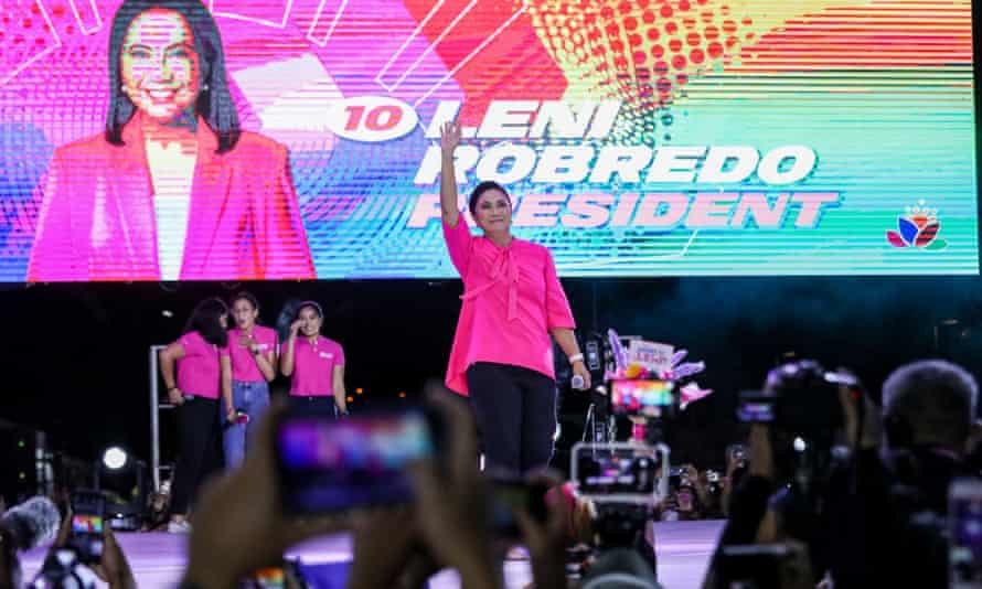 Vice-president and presidential hopeful Leni Robredo gestures as she arrives for her final campaign rally in Makati City, Metro Manila, on 7 May.