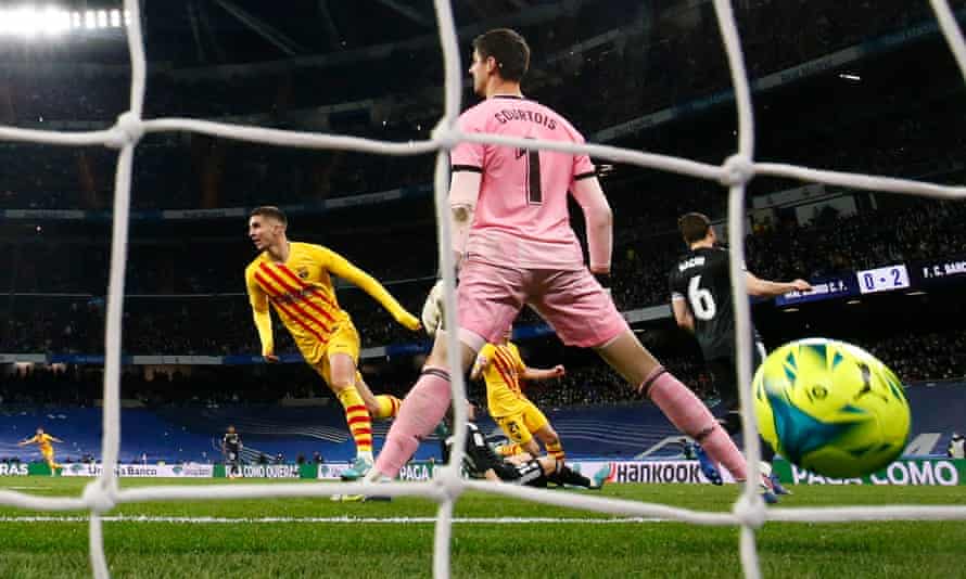 Ferran Torres wheels away after scoring Barcelona’s third goal. Real Madrid goalkeeper Thibaut Courtois later called his side’s performance ‘unacceptable’.