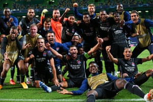 The Lyon players celebrate.