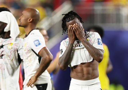 Abdul Fatawu covers his face after Ghana’s defeat by Colombia