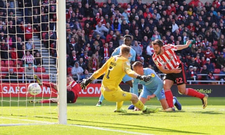 Will Grigg fires home Sunderland’s third goal of a 5-4 loss.