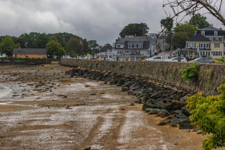 Seawall at low tide along the Plymouth, Massachusetts, shoreline waterfront.